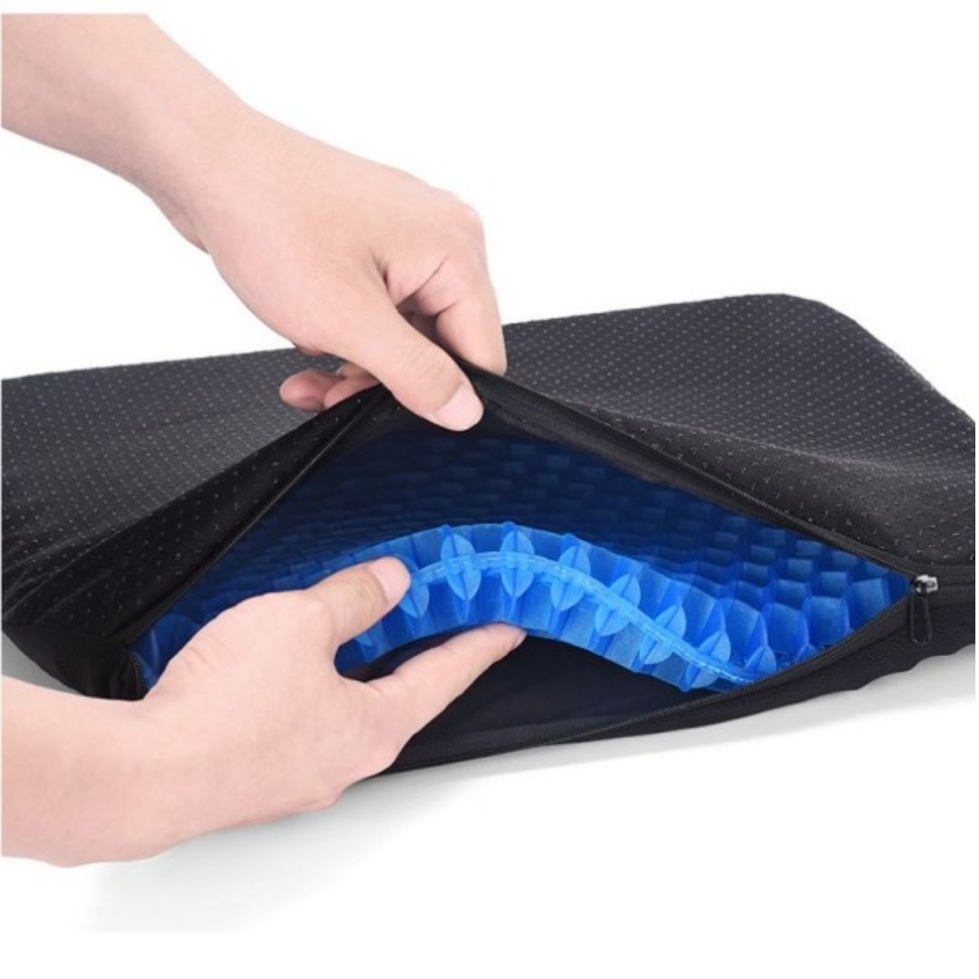Hands unzipping the cover to reveal the blue gel core inside