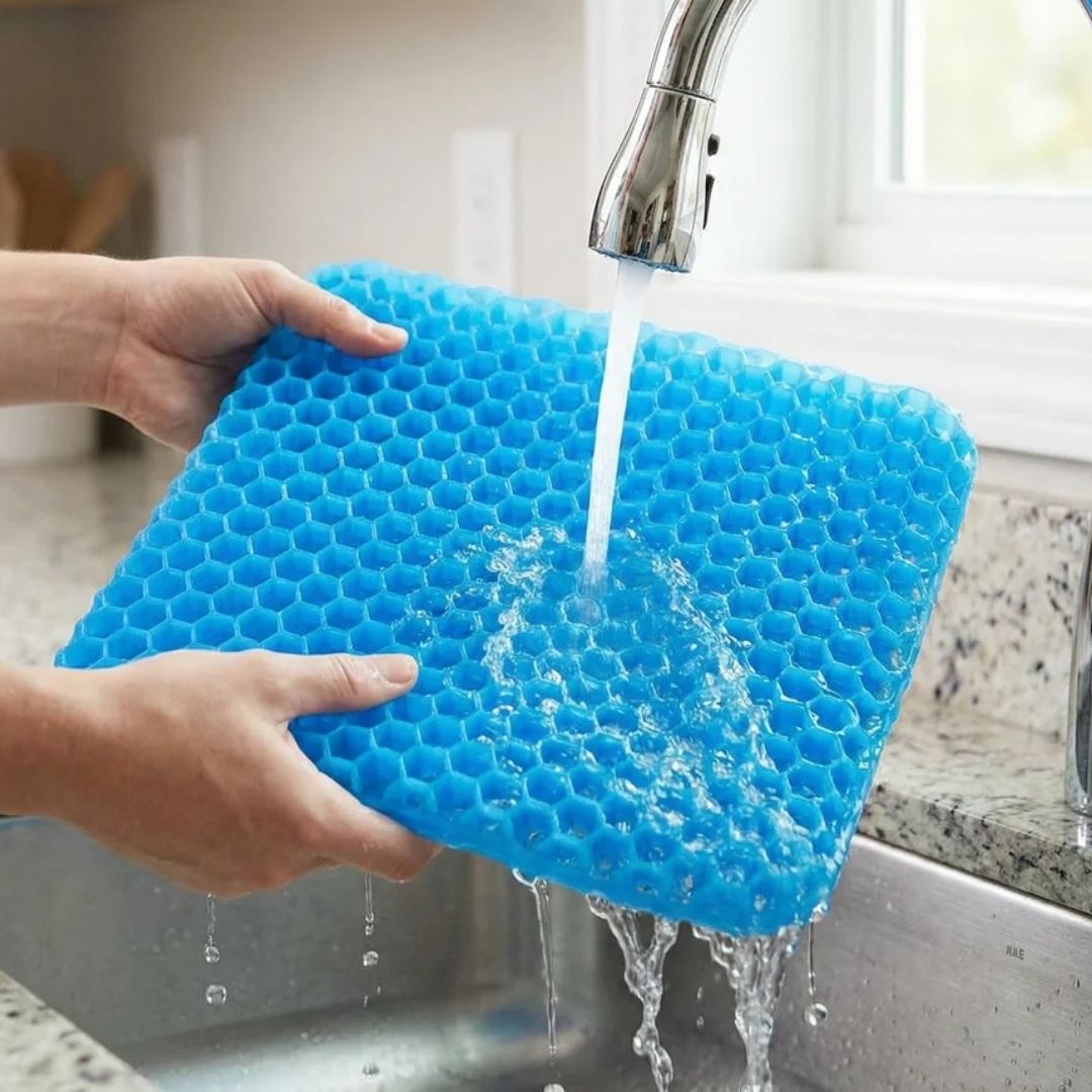CellGel+ gel core being rinsed clean under running water at a kitchen sink